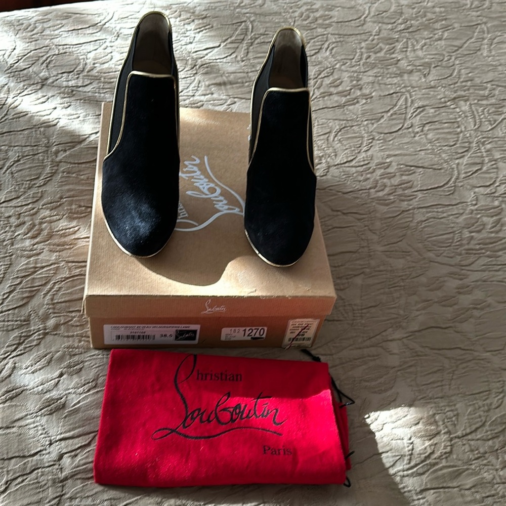 Cristian Louboutin boots.  Size 38.5 or 7